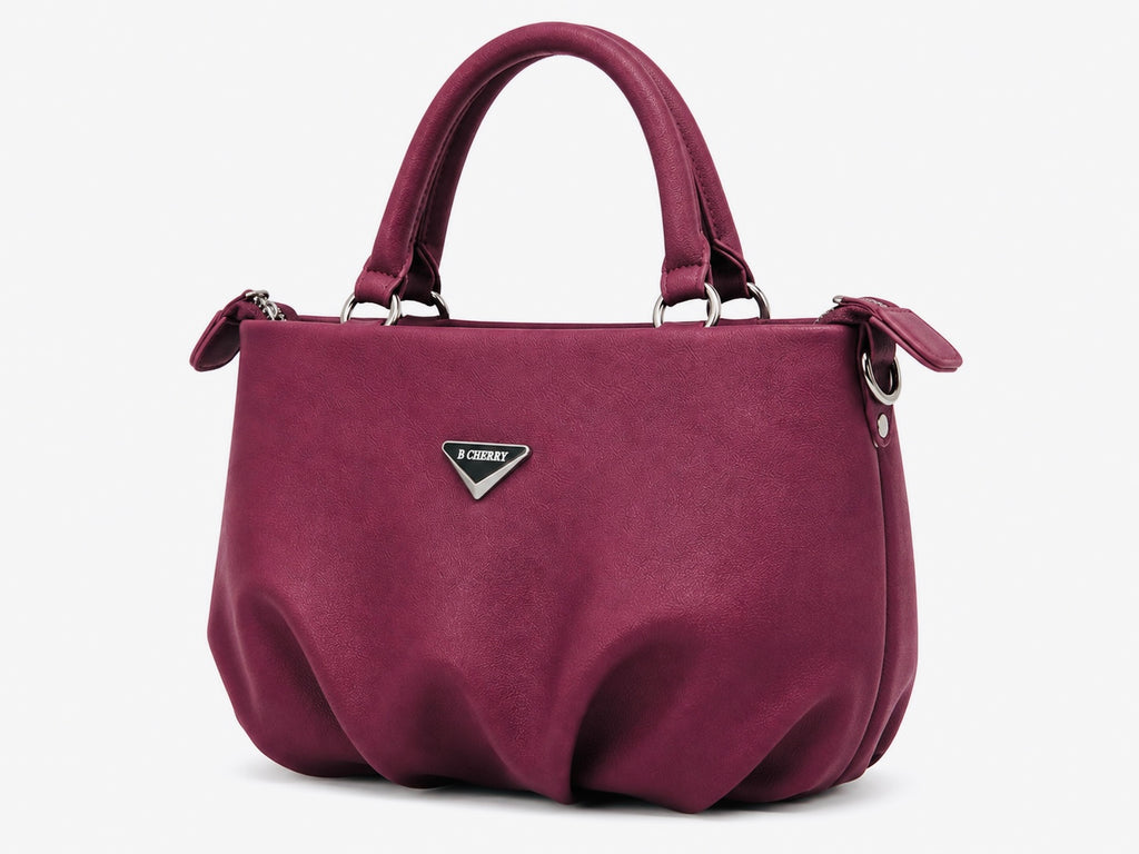 Purple handbag with a brand logo on a white background