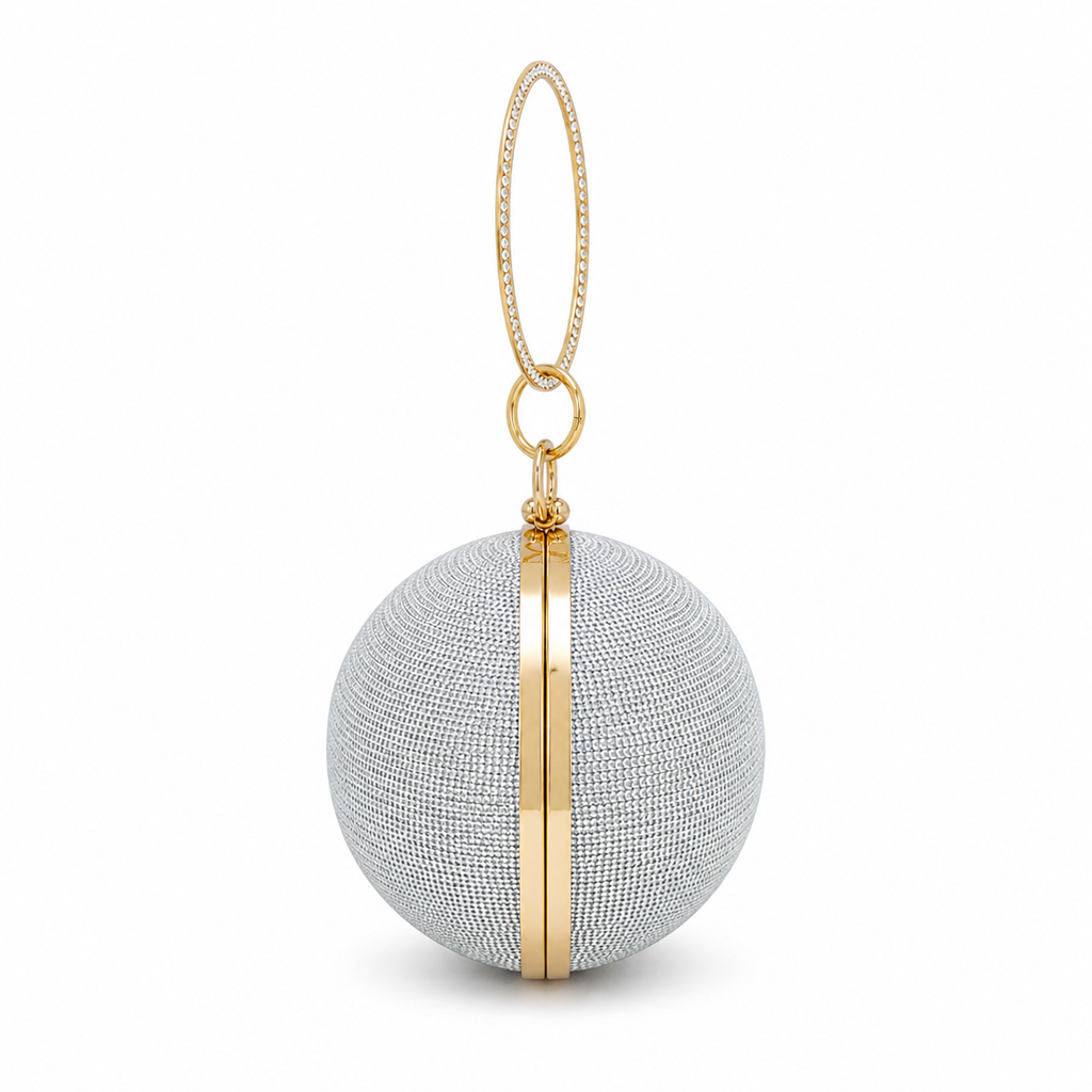 Silver spherical handbag with gold accents on a white background