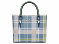 Plaid patterned handbag with green handle on a white background