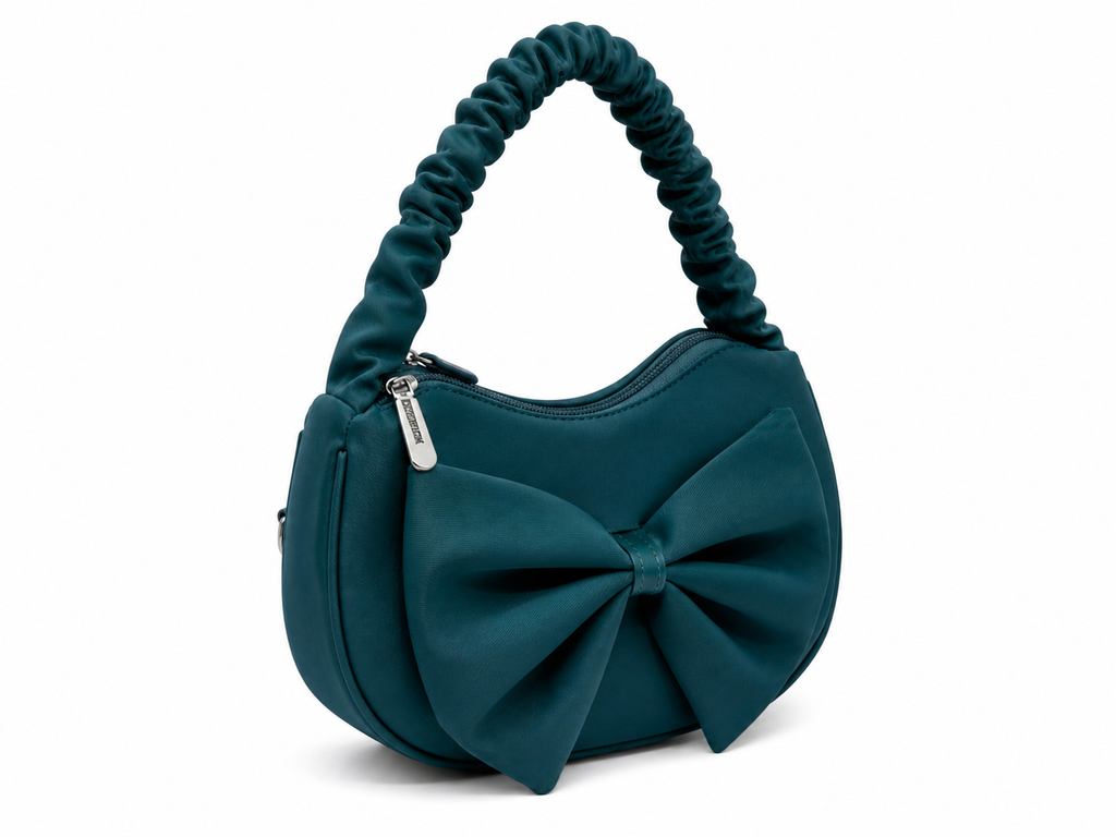 Teal handbag with a large bow on a white background