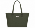 Green tote bag with a visible brand label on a white background