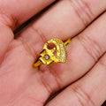 Gold ring with a unique design on a hand