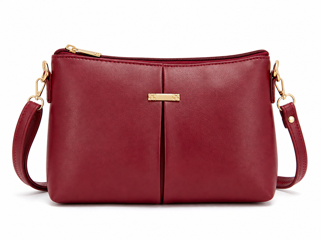 Red handbag with gold accents on a white background
