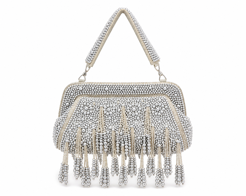 Silver beaded handbag with fringe on a white background